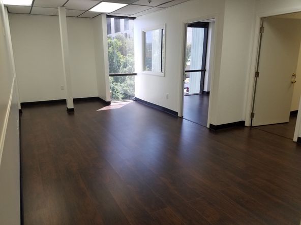 RECEPTION, TWO PRIVATE OFFICES AND OPEN SPACE. NICE LAYOUT. CORNER SUITE.
